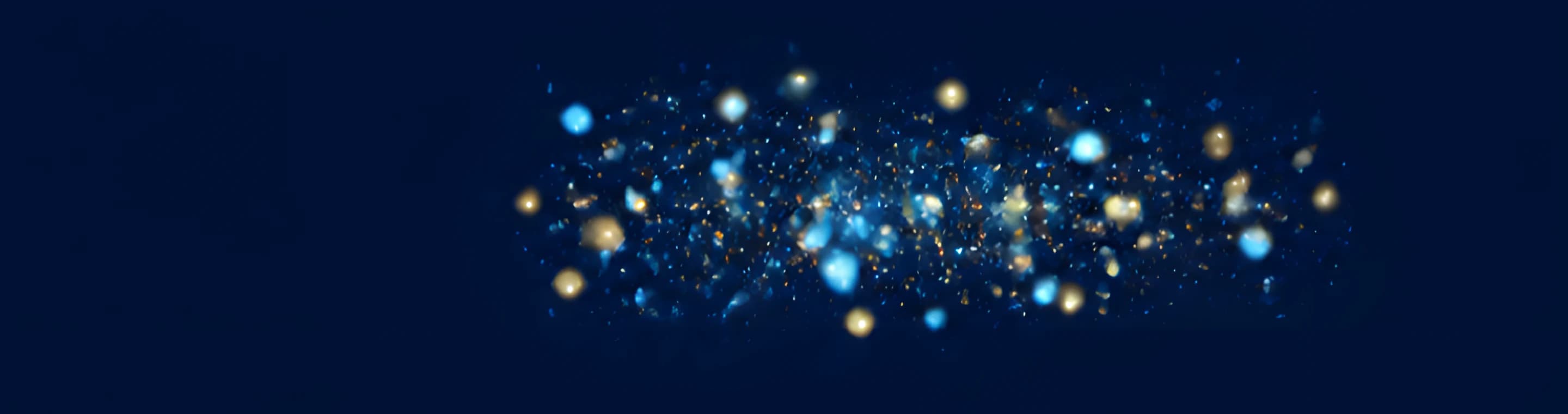 Blue-gold bokeh on deep blue