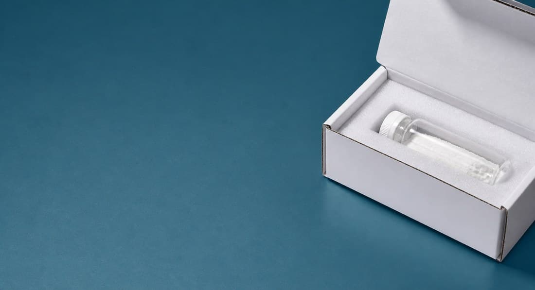 Open sample box on a dark blue background